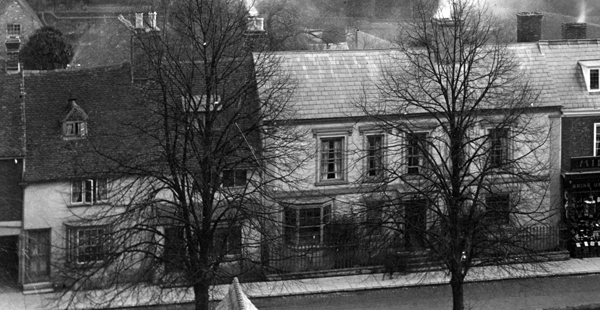 View looking down on houses and shop
